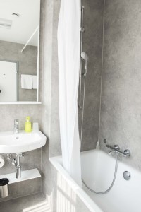 Salle de bain, baignoire/WC Hôtel Waldhorn Berne